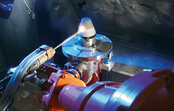 Processus de projection par flamme pour le revêtement de surface des composants dans l'industrie